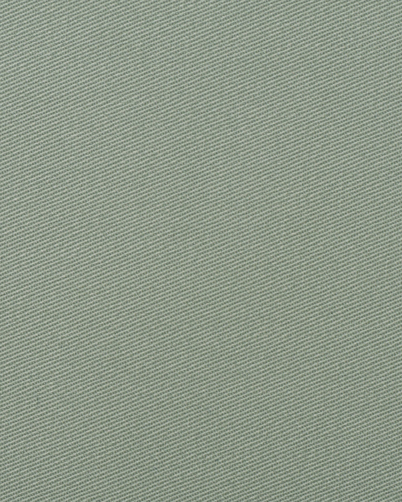 Closeup view of custom Genoa Chino pants for men by Luxire in pistachio green