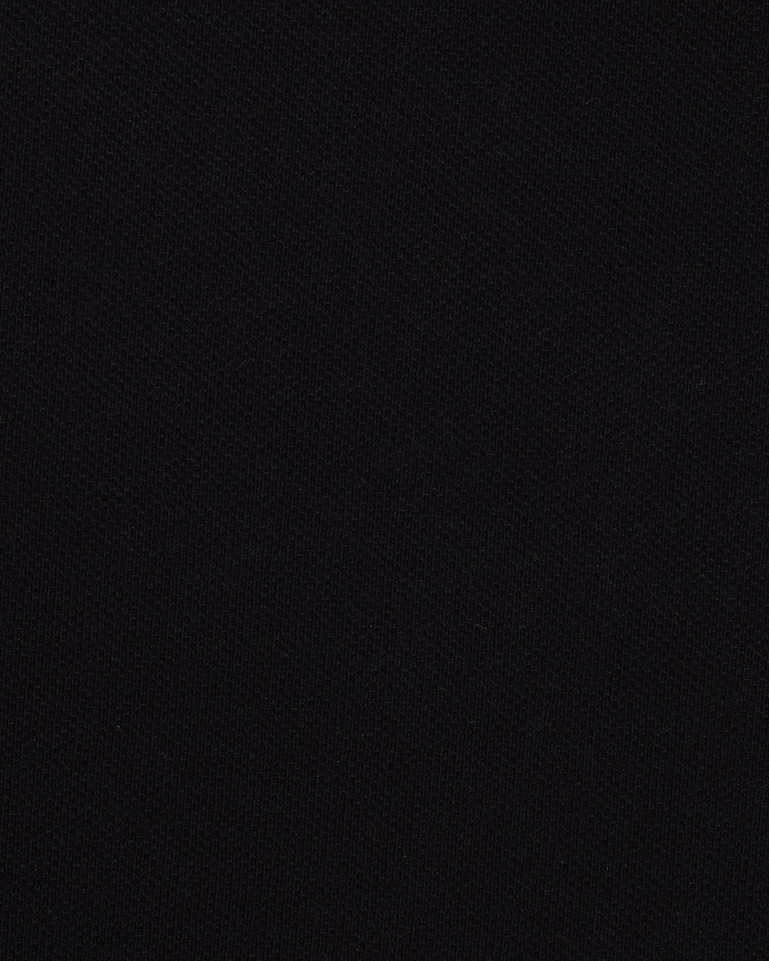 Close up of the custom oxford polo shirt for men by Luxire in black pique