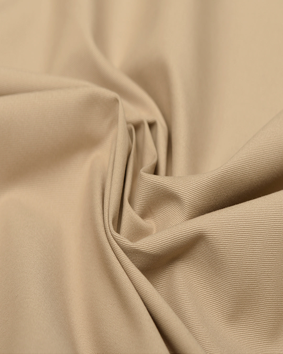 Close up view of custom Genoa Chino pants for men by Luxire in beige