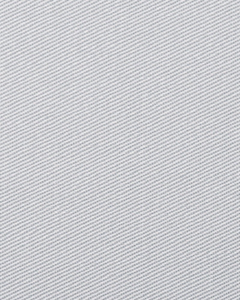 Close up view of custom Genoa Chino pants for men by Luxire in light grey