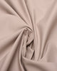 Closeup view of custom Genoa Chino pants for men by Luxire in pale pink