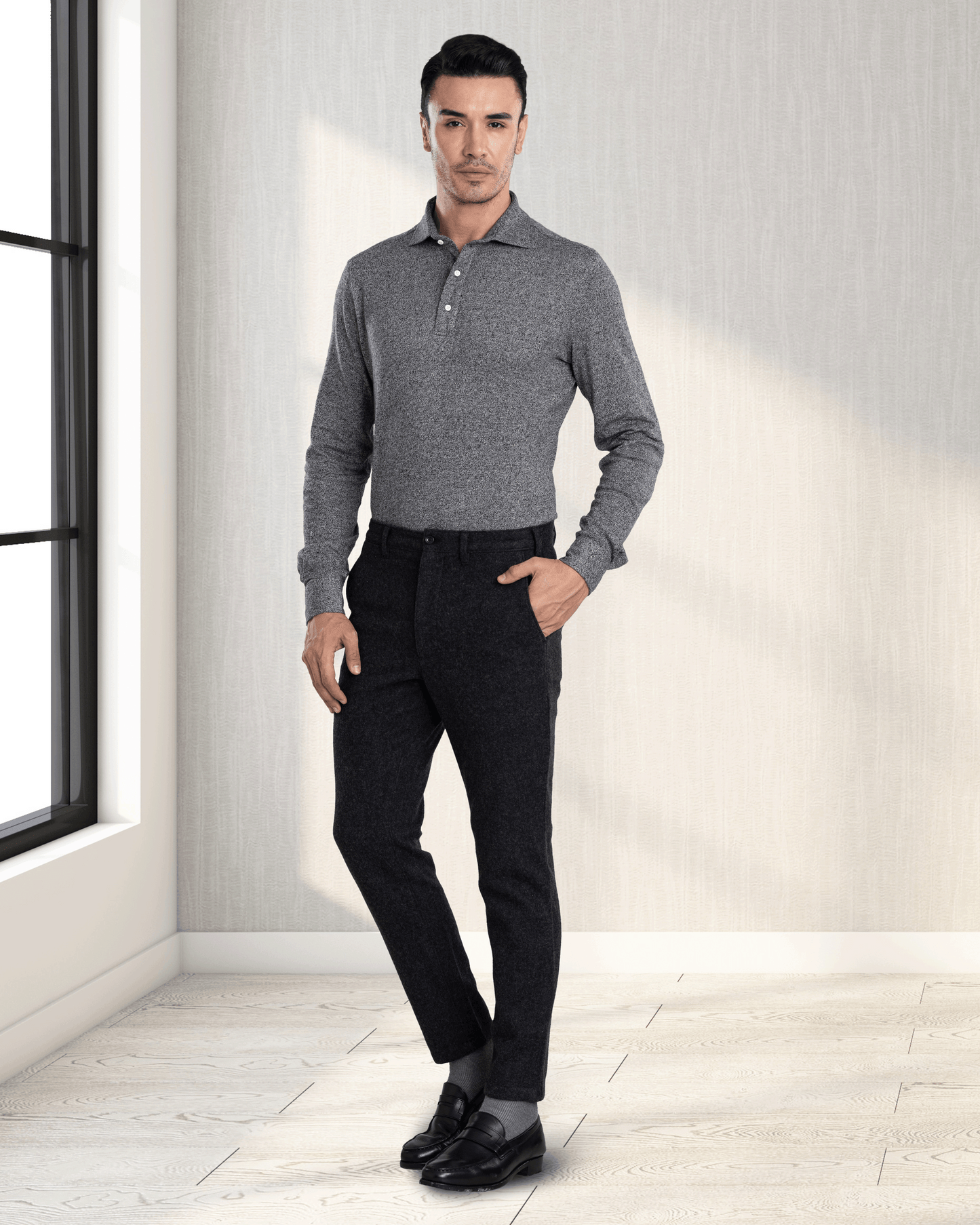 Model wearing custom wool Chino pants for men by Luxire in charcoal grey hand in pocket