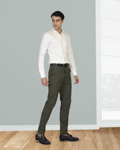 Model wearing custom Genoa Chino pants for men by Luxire in olive green