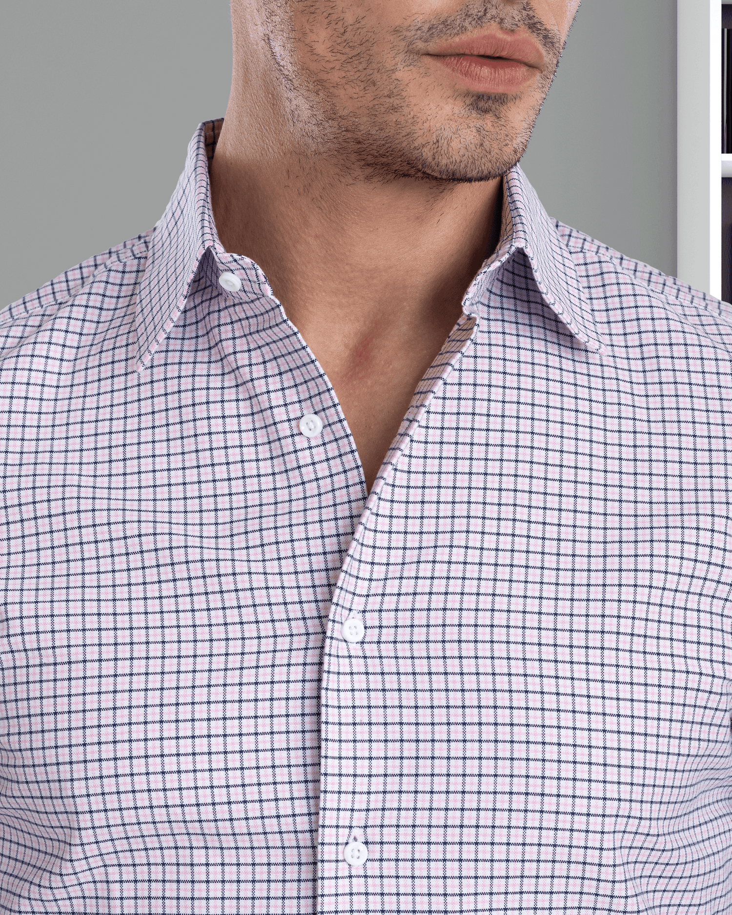 Model close up wearing custom check shirts for men by Luxire navy pink tattersall