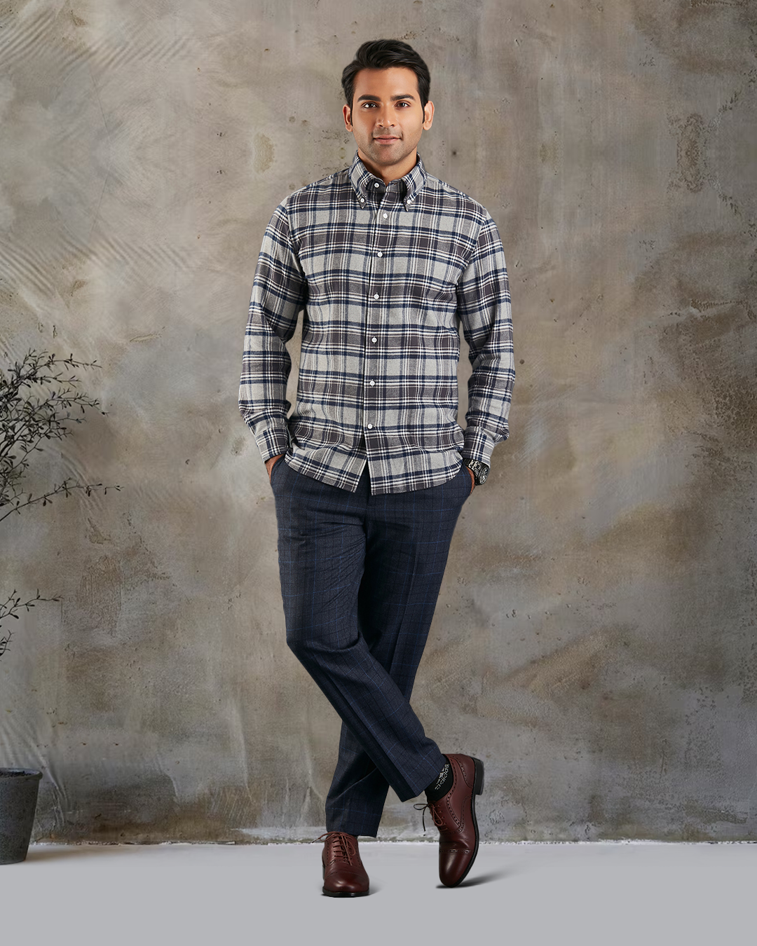 Model wearing custom check shirts for men by Luxire dark grey and navy hands in pockets