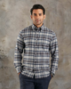 Top half model wearing custom check shirts for men by Luxire dark grey and navy