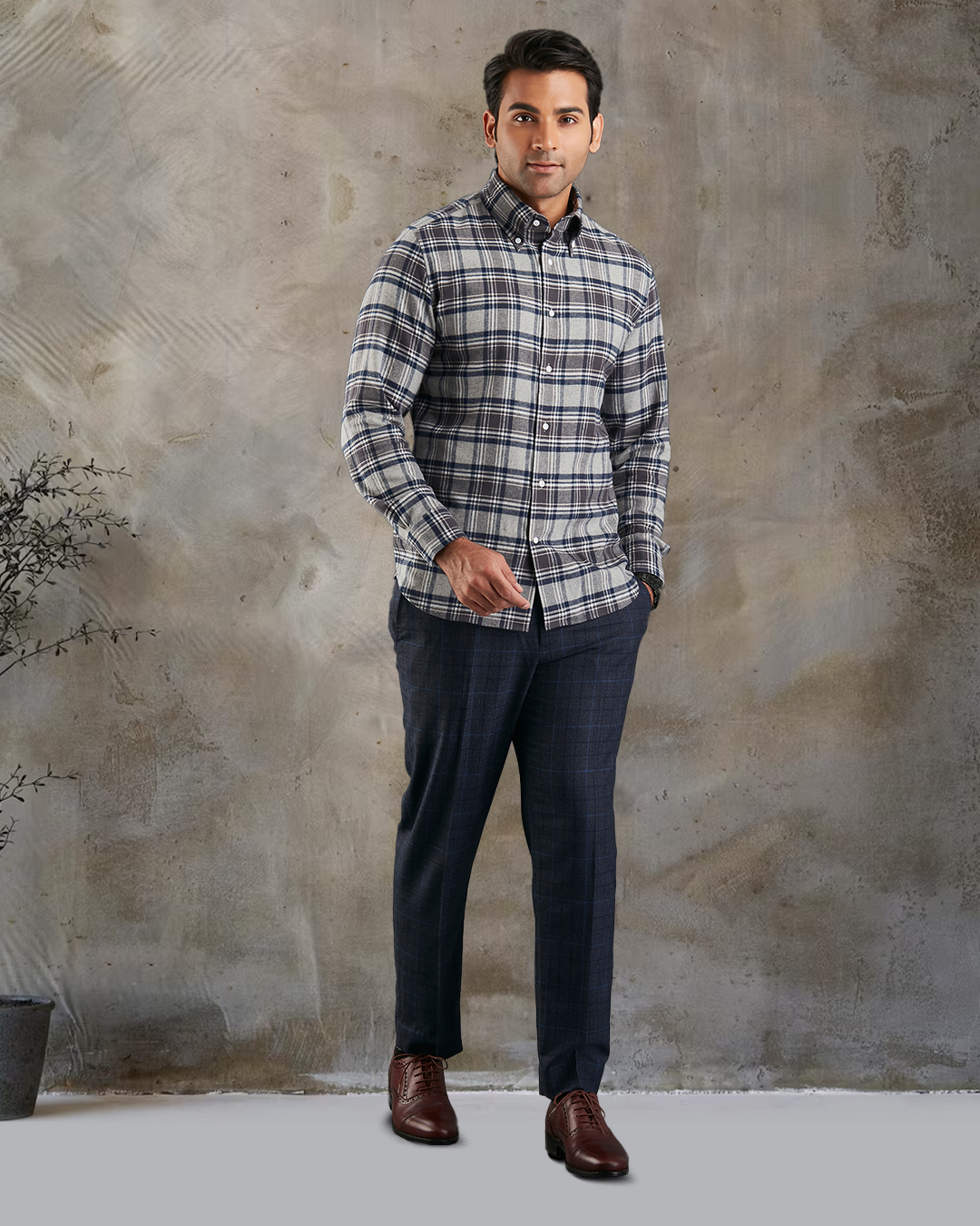Model wearing custom check shirts for men by Luxire dark grey and navy hand in pocket