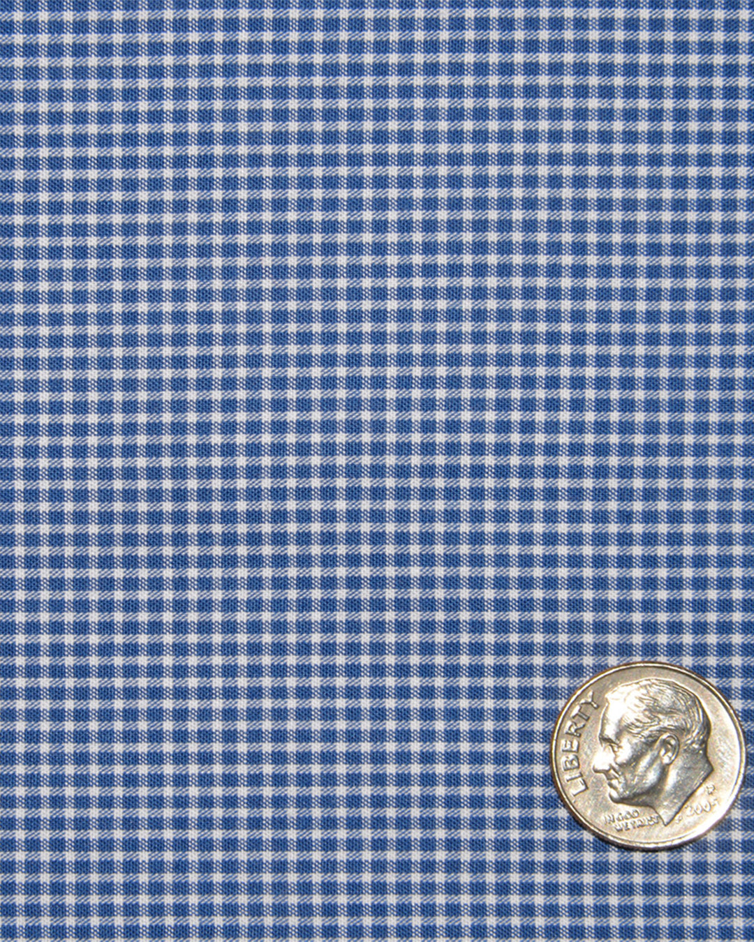 Closeup view of custom check shirts for men by Luxire royal blue micro gingham