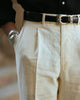 Model close up of custom linen Gurkha pants for men by Luxire in cream