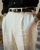 Model front view of custom linen Gurkha pants for men by Luxire in cream