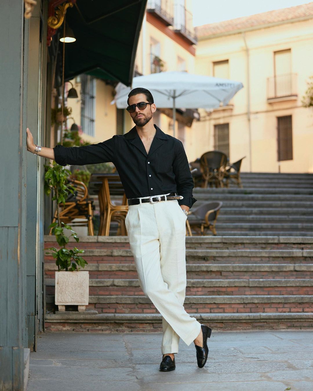 Male model wearing custom linen Gurkha pants for men by Luxire in cream