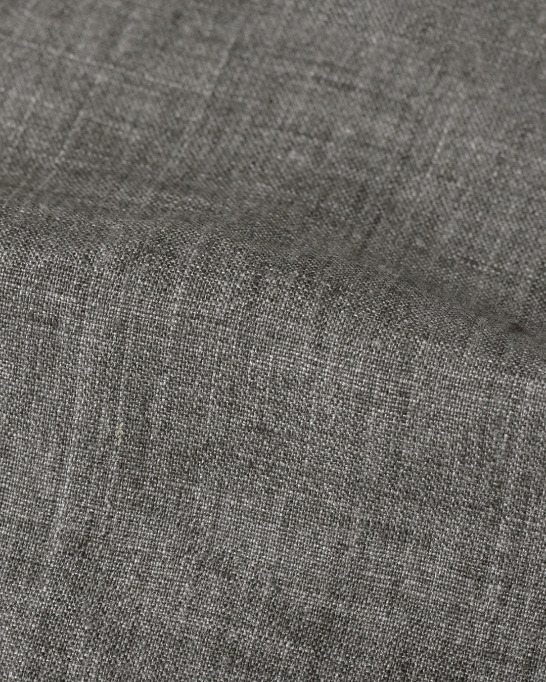 Close up view of custom linen pants for men by Luxire in stone grey