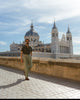 Model outside wearing mens custom polo cotton camp shirt by Luxire in olive green hand in pocket 8