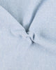 Close up fabric of the custom oxford polo shirt for men by Luxire in light blue with dots