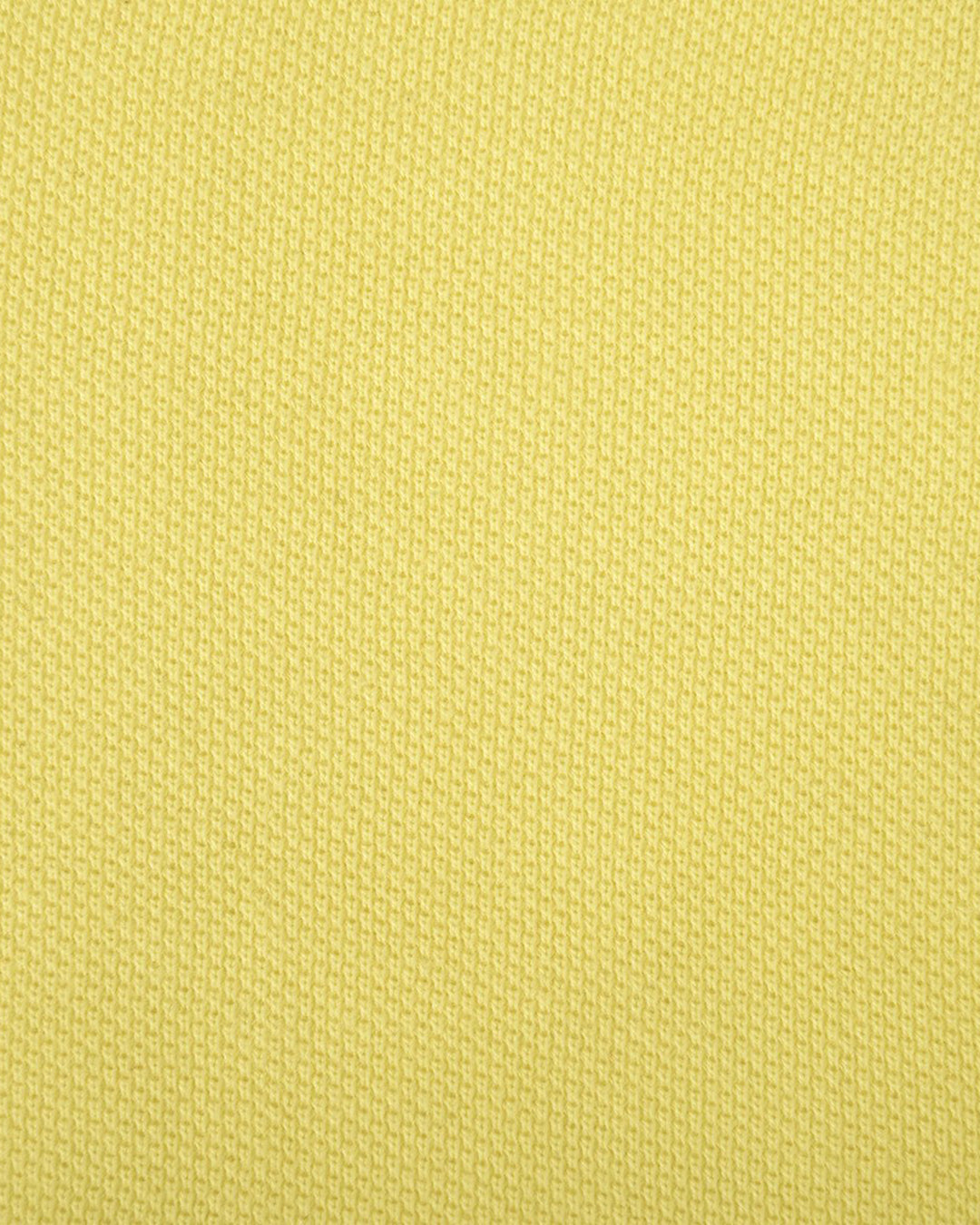Close up of the custom oxford polo shirt for men by Luxire in mid yellow
