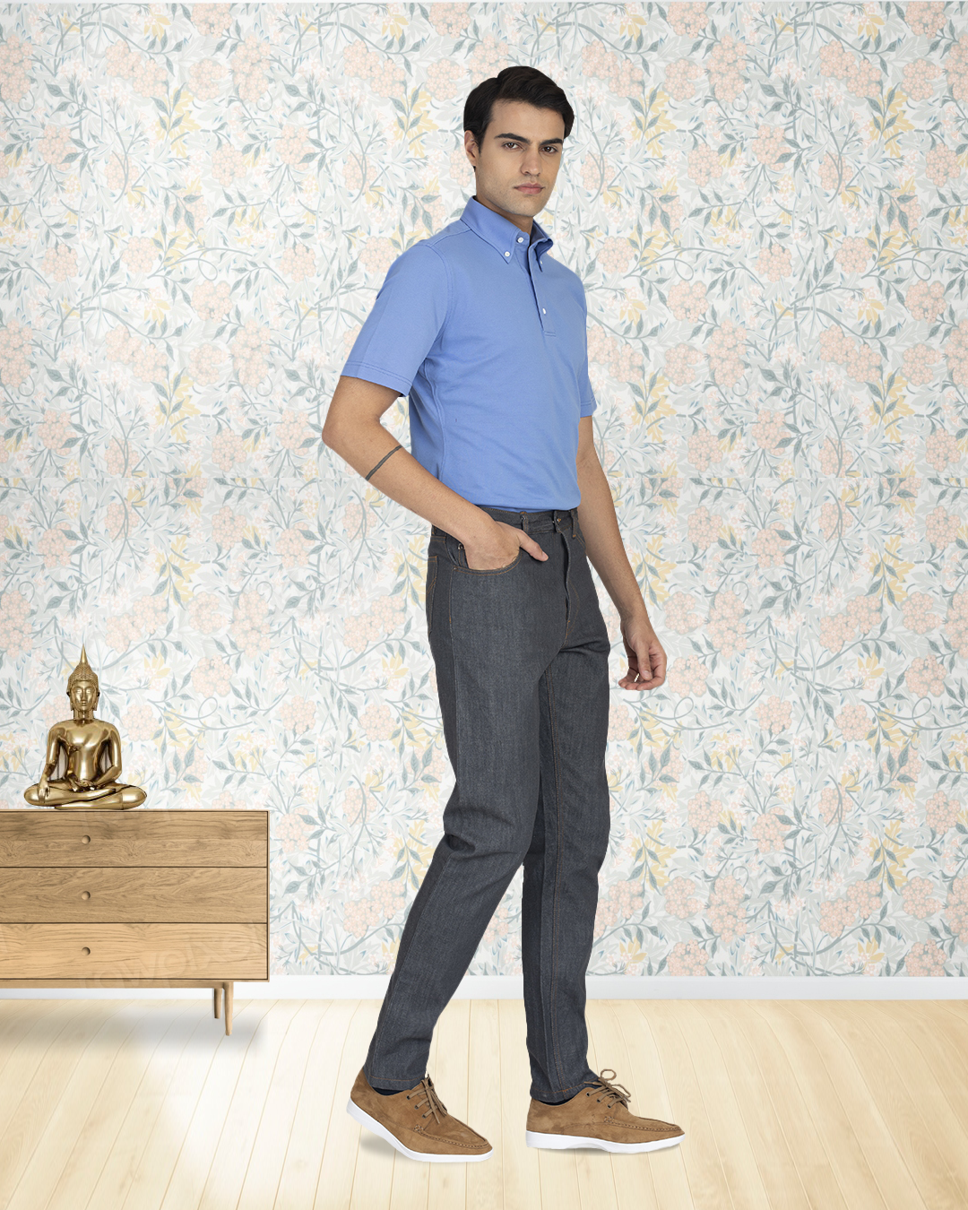 Model wearing custom  jeans for men by Luxire in grey