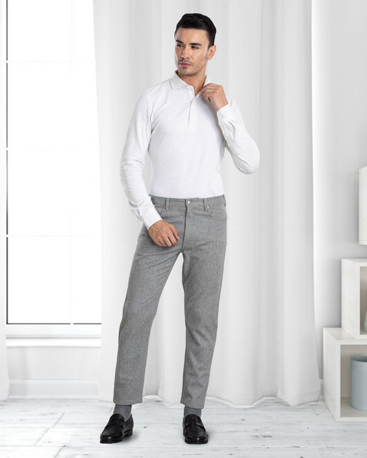 Model wearing mens wool jeans by Luxire in grey