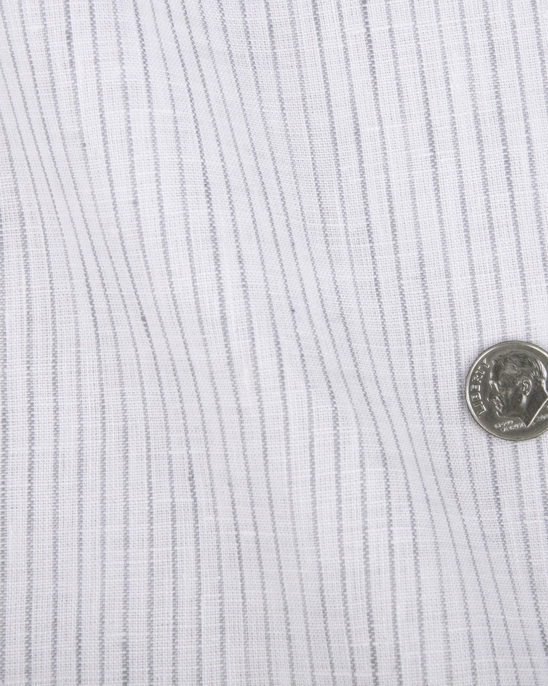 Close up of the custom linen shirt for men in grey pinstripes by Luxire Clothing