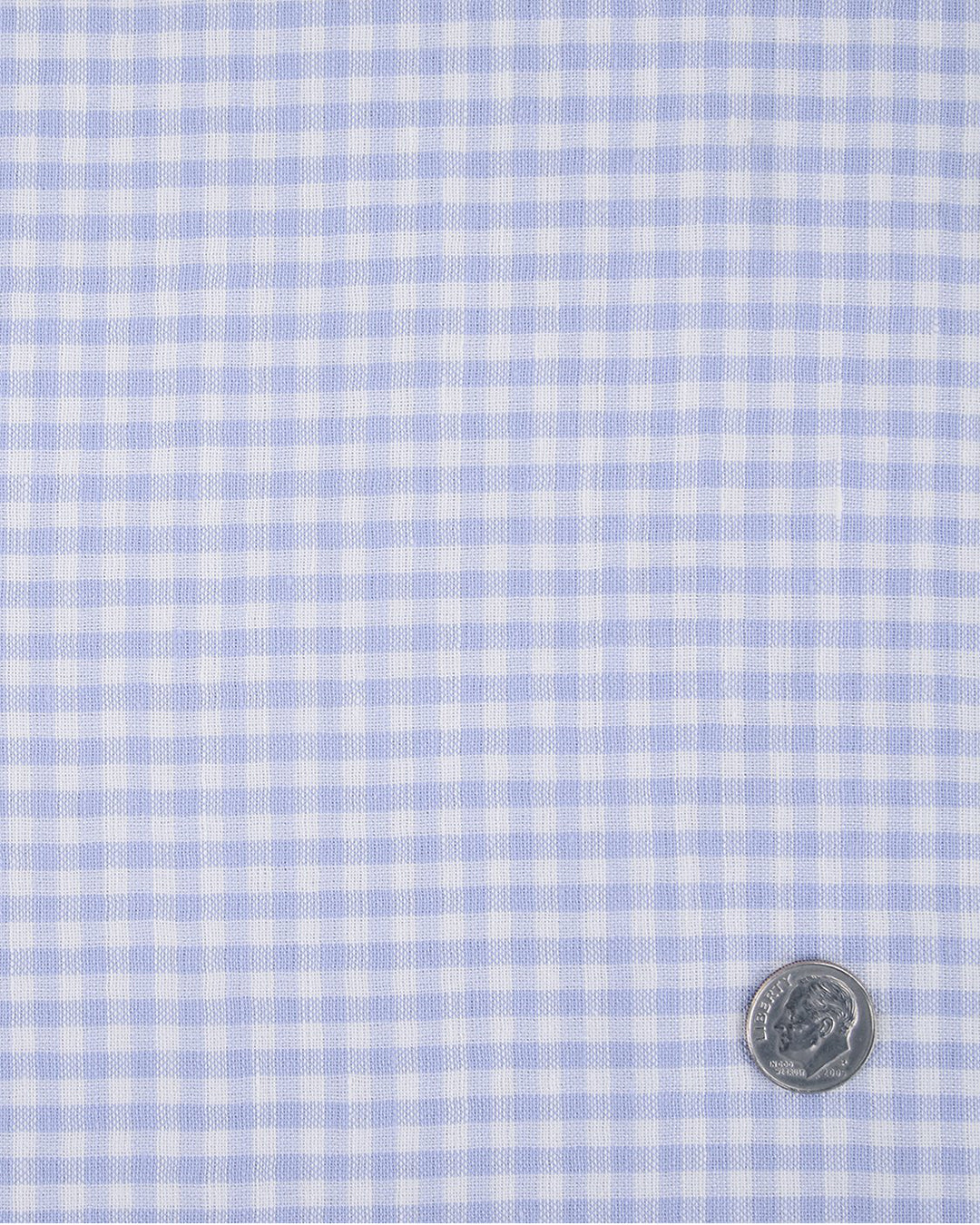 Close up of the custom linen shirt for men in light blue with blue gingham checks by Luxire Clothing