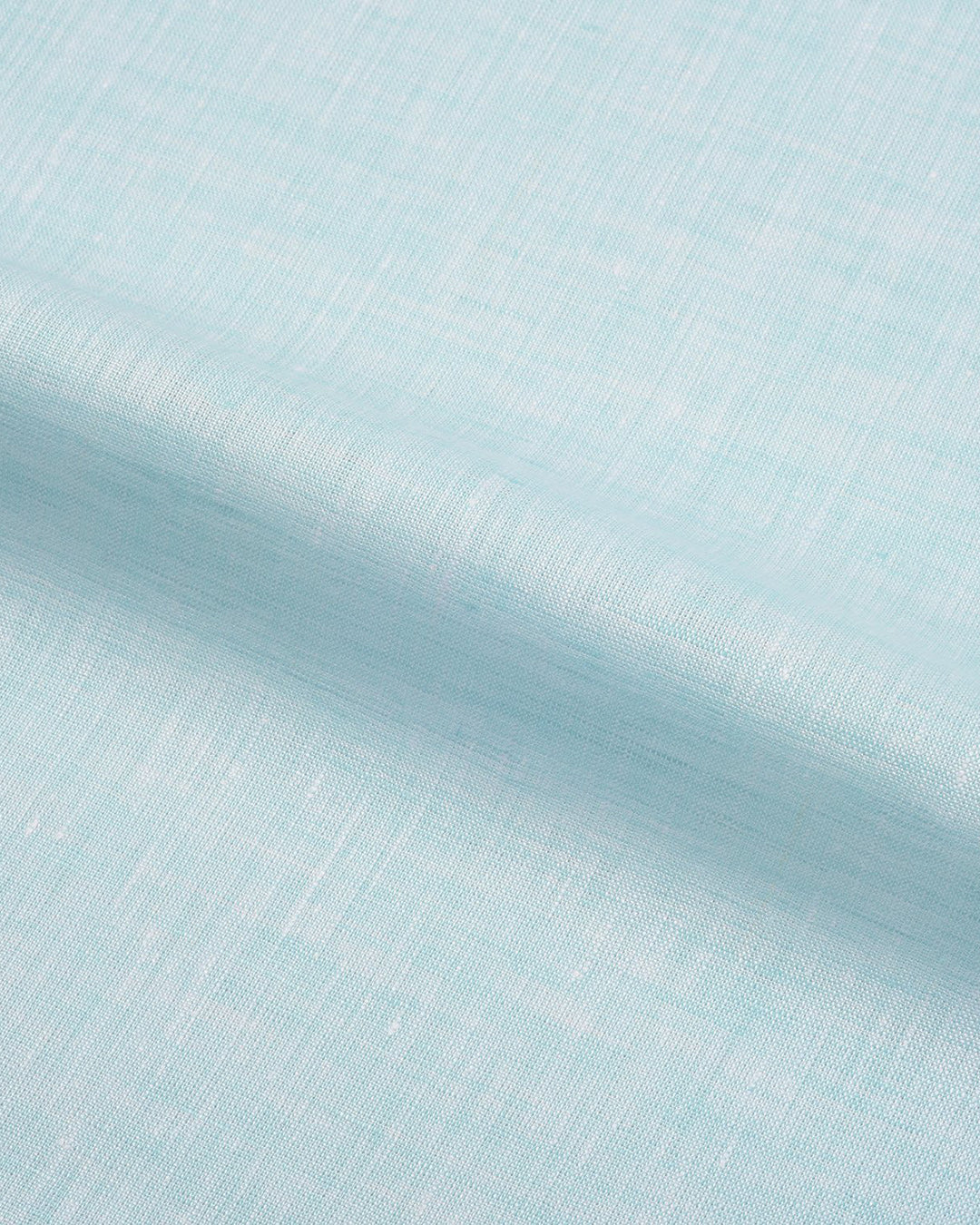 Close up of the custom linen shirt for men in sea green by Luxire Clothing