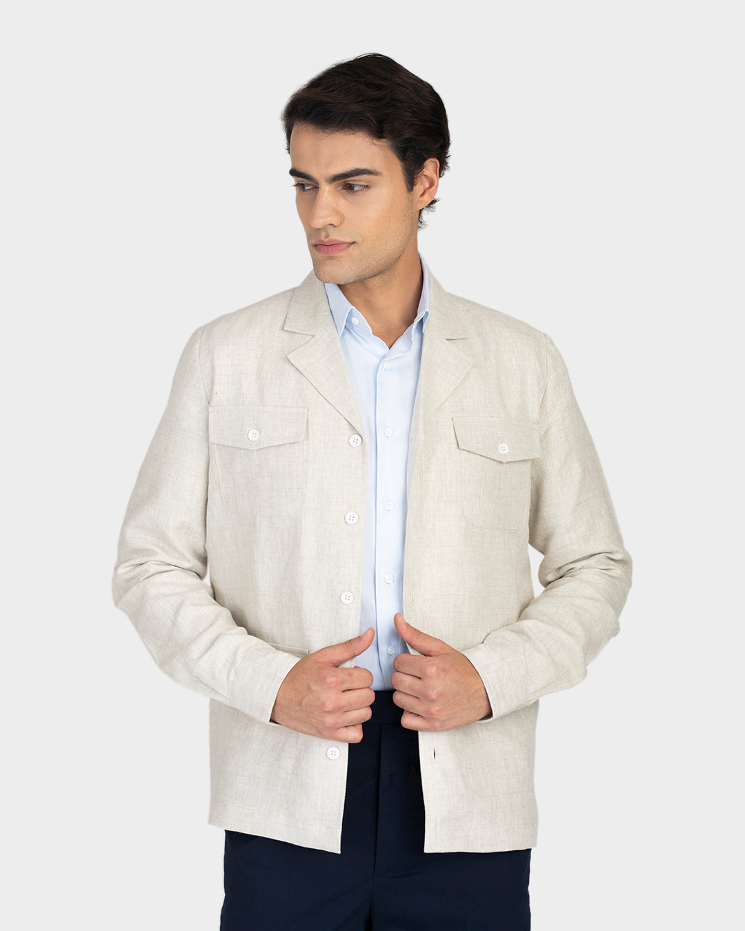 Model wearing the muslin shirt jacket for men by Luxire hands together